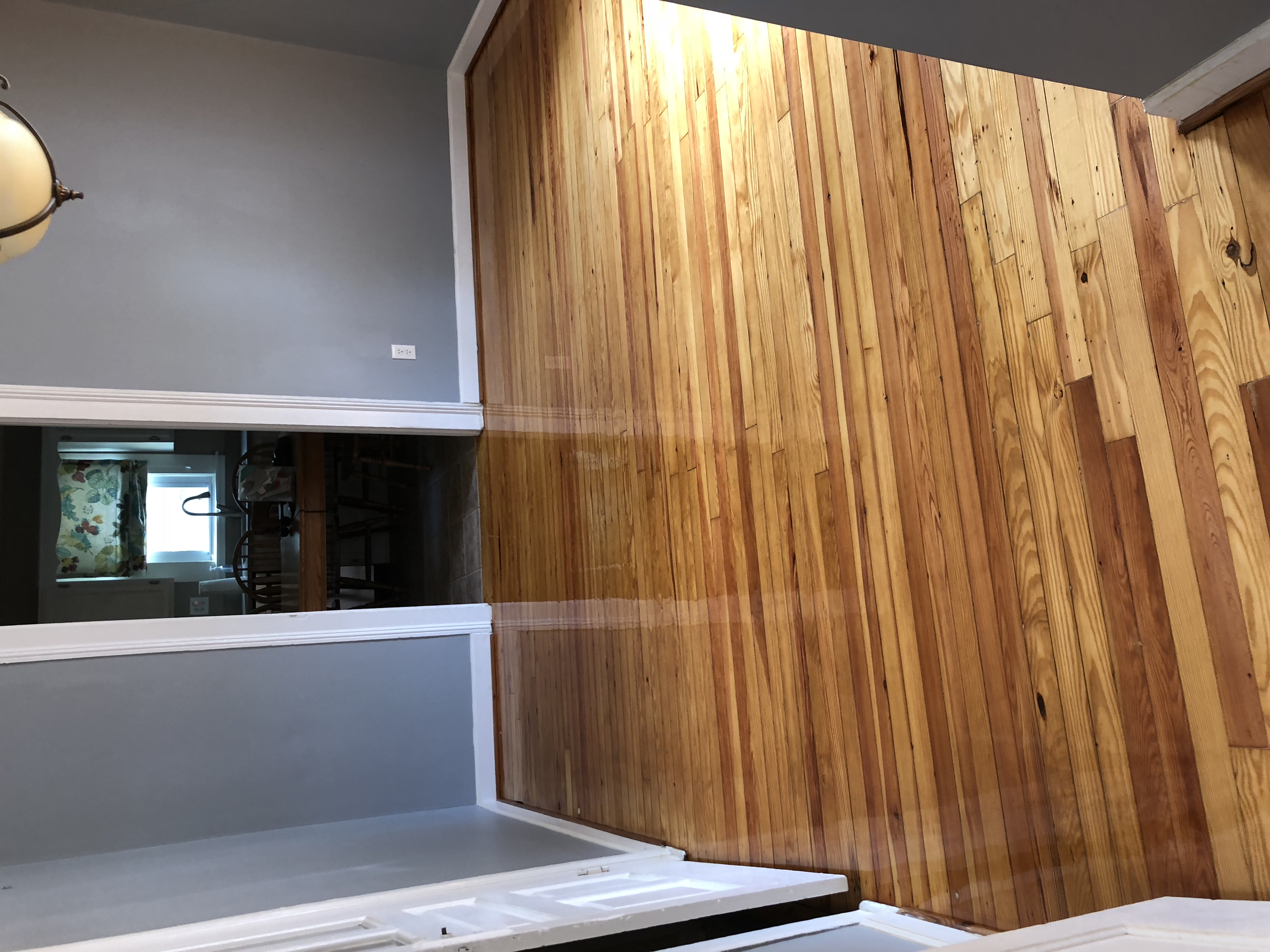 Restored pine hardwood flooring in an old house