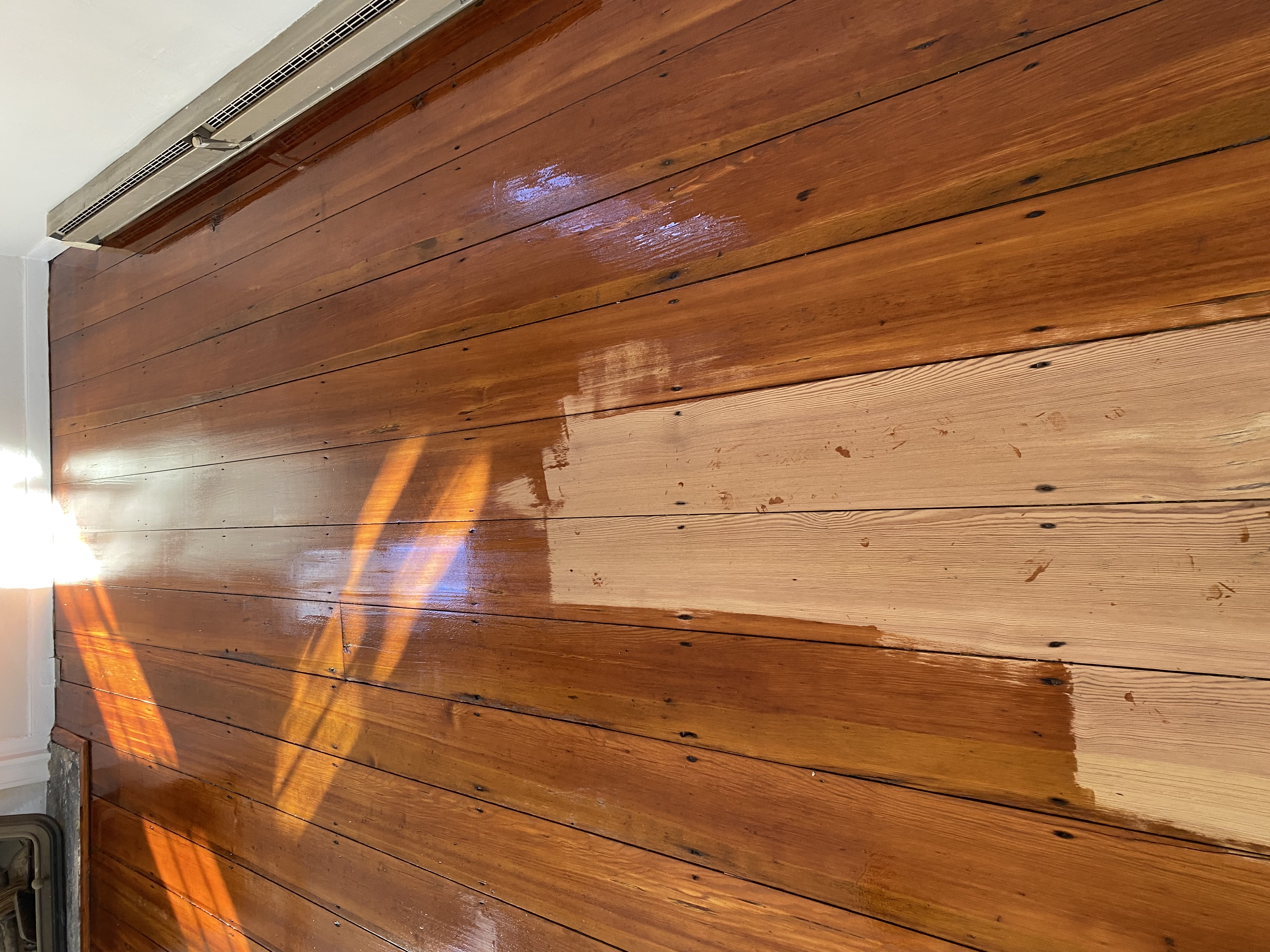 Restored antique hardwood flooring after stain or finish application