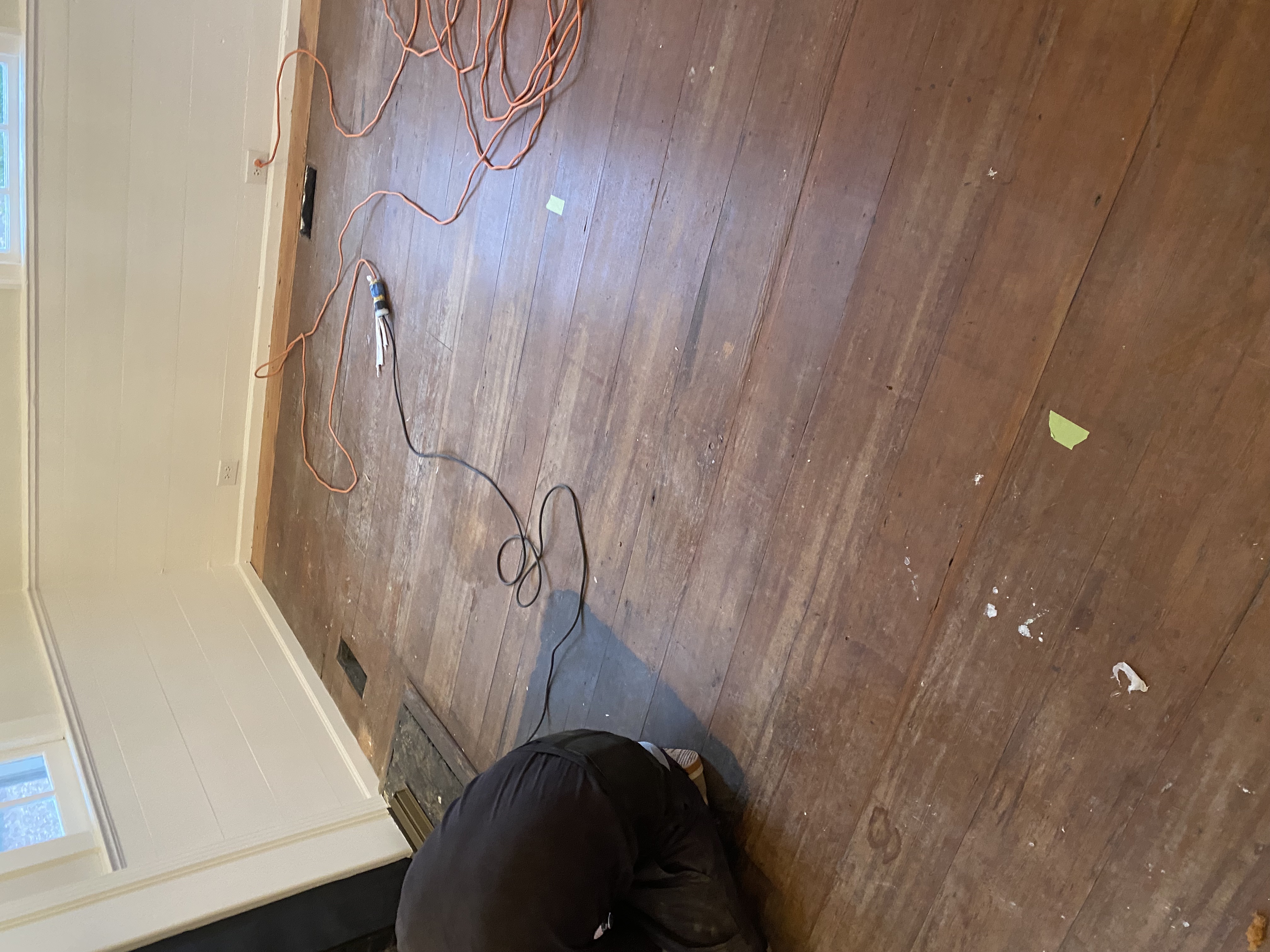 Original hardwood flooring prepared for restoration work
