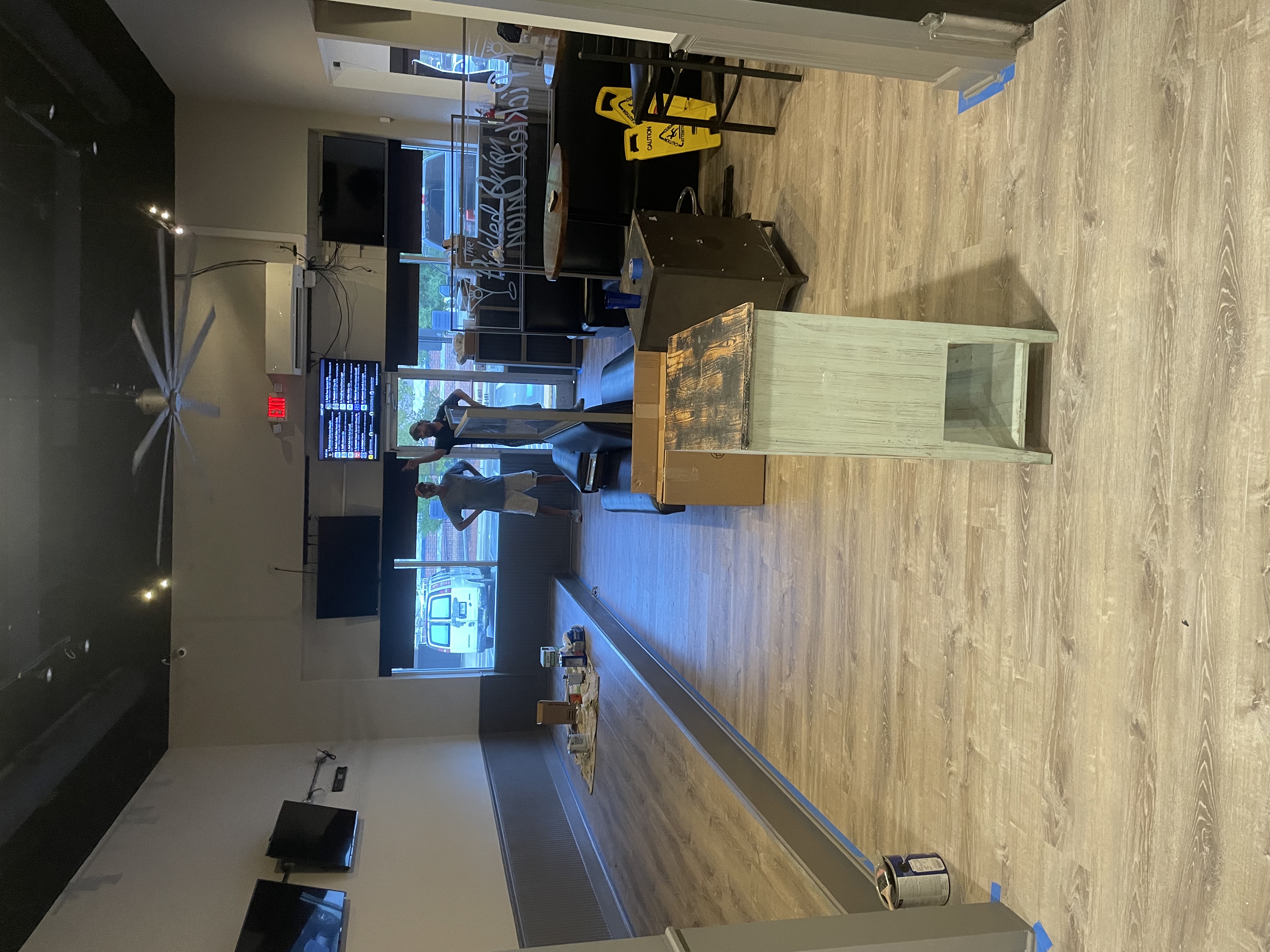 Completed luxury vinyl plank flooring at business entrance