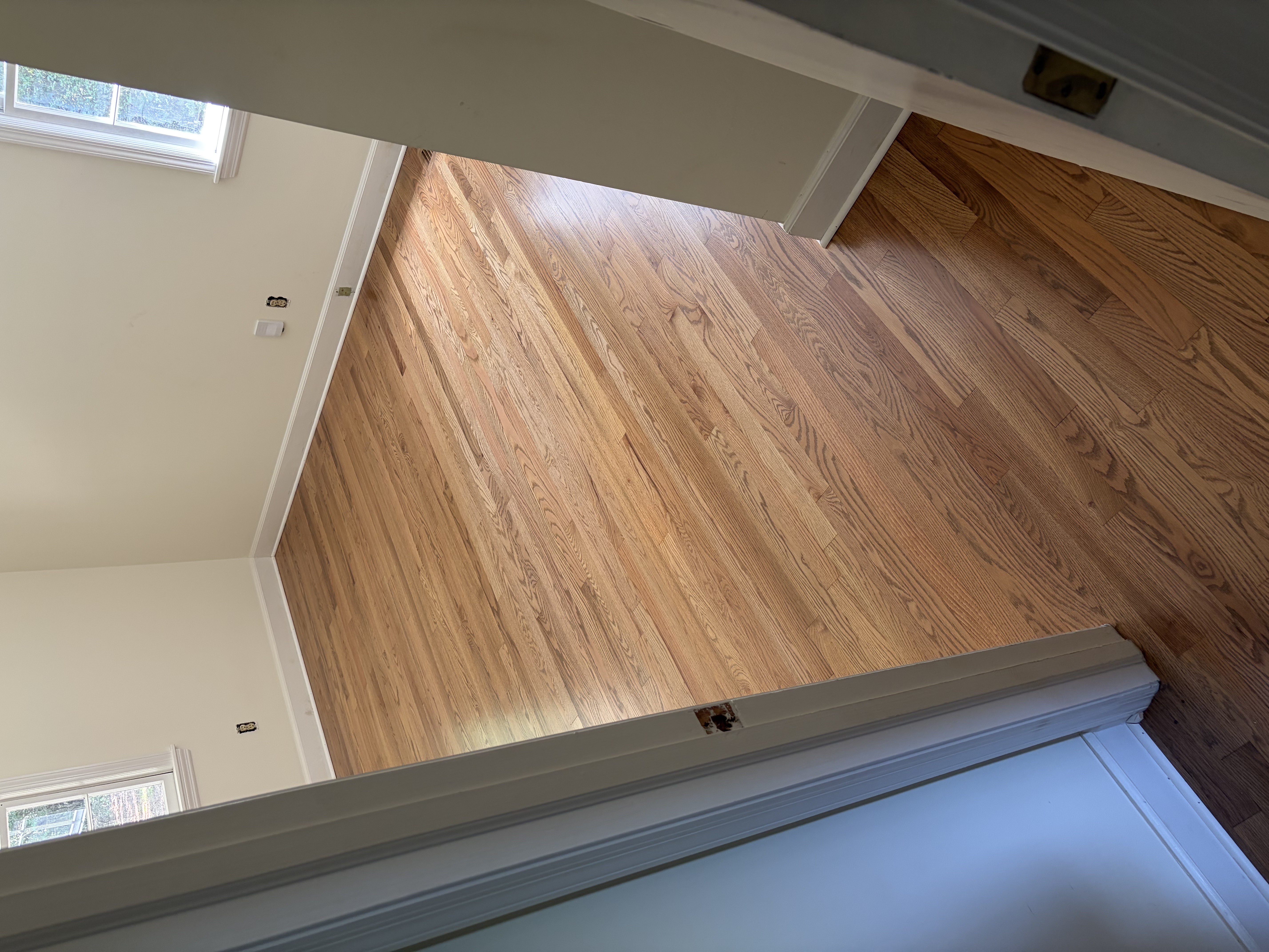 Completed oak flooring in bedroom three with a Weathered Oak stain and oil-based finish