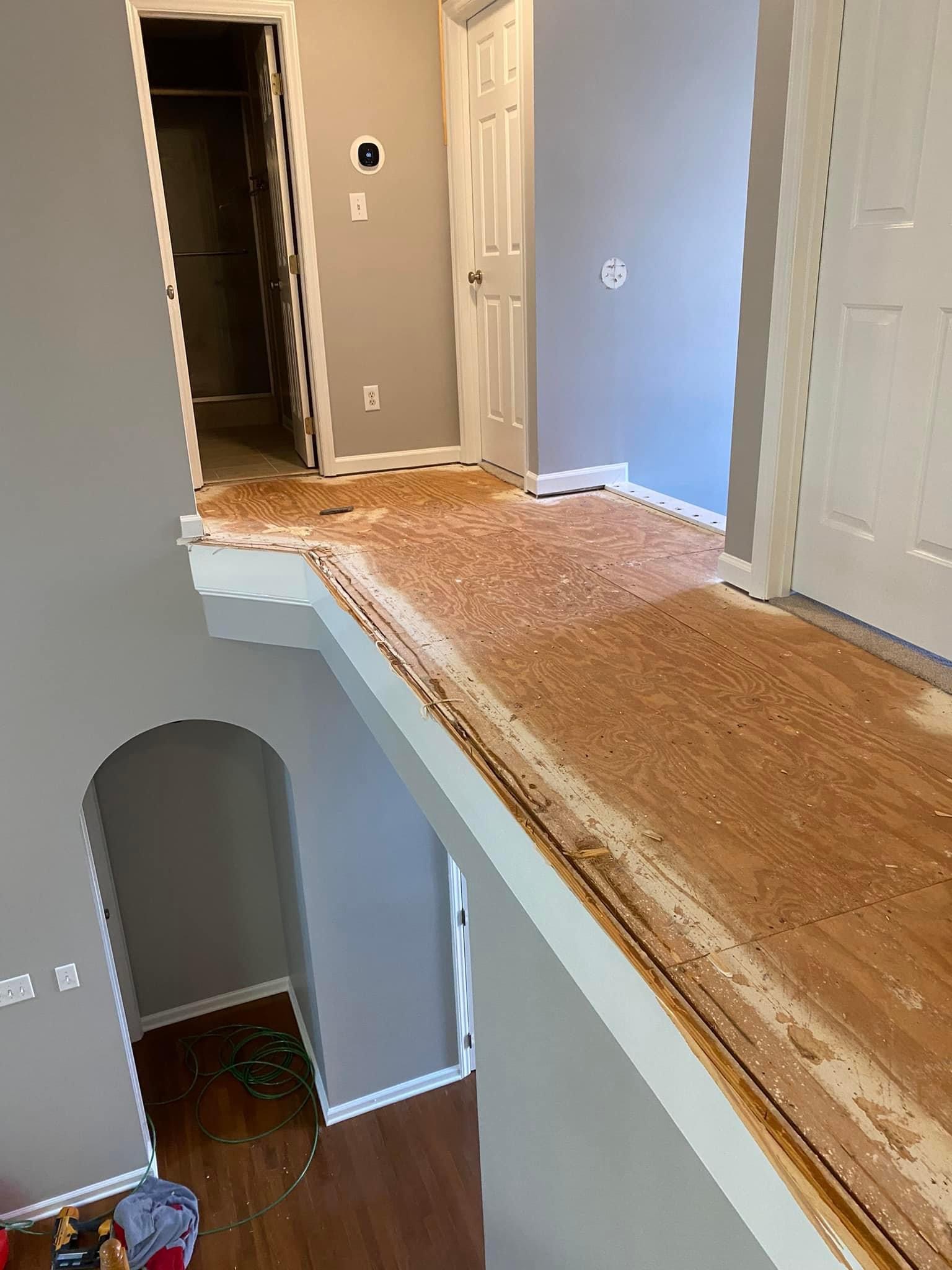 Upstairs hallway prepared for nosing and new prefinished hardwood